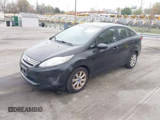 2011 Ford Fiesta SE with VIN 3FADP4BJ5BM221349, listed as a IAAI auction lot 41948737 with 216,540 mi miles. Bid and sale history available at carsss.com. Image 2.