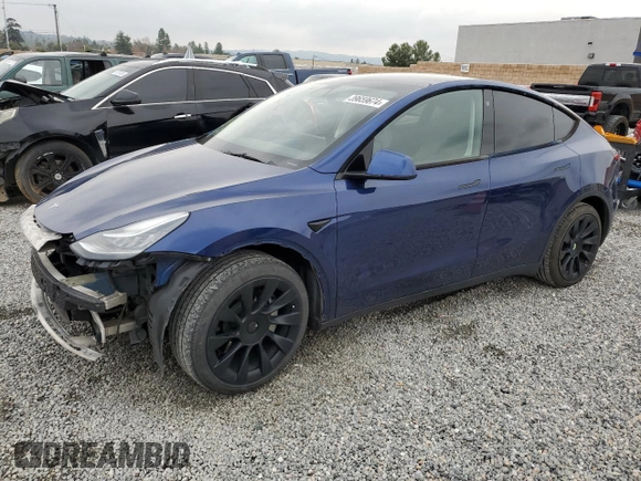 2021 Tesla Model Y Long Range with VIN 5YJYGDEEXMF213376, listed as a Copart auction lot 39659674 with 76,110 mi miles and Salvage Title. Bid and sale history available at DreamBid. Image 1.