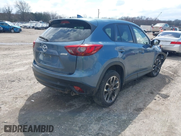 2016 Mazda CX-5 Grand Touring with VIN JM3KE4DY0G0629924, listed as a IAAI auction lot 41878154 with 78,196 mi miles. Bid and sale history available at carsss.com. Image 4.