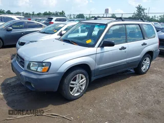 2004 Subaru Forester X with VIN JF1SG63664H736980, listed as a IAAI auction lot 42666843 with 154,405 mi miles and . Bid and sale history available at DreamBid. Image 2.