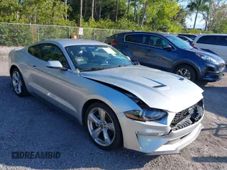 2019 Ford Mustang EcoBoost with VIN 1FA6P8TH9K5173906, listed as a IAAI auction lot 41343490 with 57,269 mi miles and . Bid and sale history available at carsss.com. Image 1.