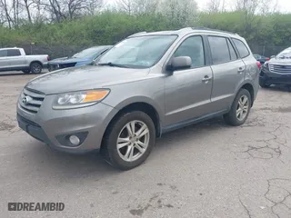 2012 Hyundai Santa Fe SE with VIN 5XYZHDAG4CG113063, listed as a IAAI auction lot 41971620 with 228,796 mi miles. Bid and sale history available at carsss.com. Image 2.