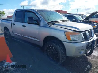2004 Nissan Titan LE z VIN 1N6AA07B34N518151, wystawiony jako IAAI lot #42389182 z przebiegiem 334 503 mil mil oraz . Historia ofert i sprzedaży dostępna na DreamBid. Obrazek 1.
