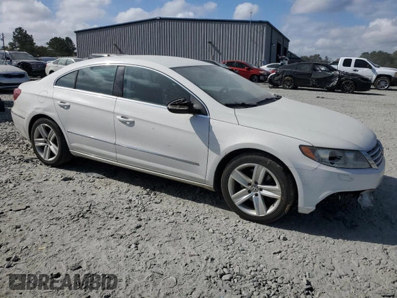 2013 Volkswagen CC Sport with VIN WVWBP7ANXDE565694, listed as a Copart auction lot 77947514 with 180,160 mi miles and Salvage Title. Bid and sale history available at carsss.com. Image 4.