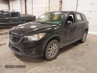 2015 Mazda CX-5 Sport with VIN JM3KE4BY0F0542655, listed as a IAAI auction lot 41471568 with 165,386 mi miles. Bid and sale history available at carsss.com. Image 2.