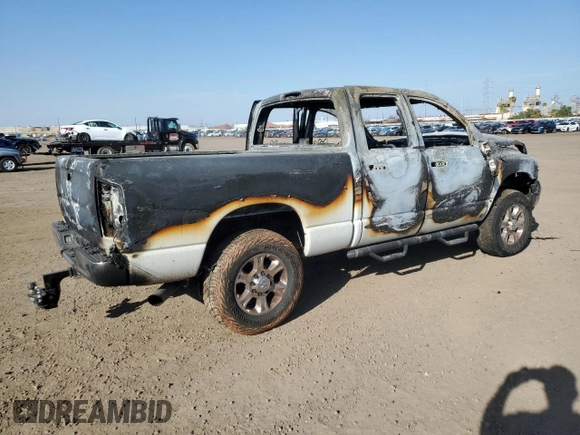 2005 Dodge Ram 2500 SLT with VIN 3D7KS28C25G842795, listed as a Copart auction lot 74001034 with 0 mi miles and Salvage Title. Bid and sale history available at carsss.com. Image 3.