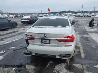 2018 BMW 7 Series 740i xDrive with VIN WBA7E4C59JGV23876, listed as a IAAI auction lot 41381398 with 106,675 mi miles. Bid and sale history available at carsss.com. Image 16.