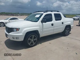 2014 Honda Ridgeline Sport with VIN 5FPYK1F71EB011340, listed as a IAAI auction lot 42741956 with 156,149 mi miles and . Bid and sale history available at DreamBid. Image 17.