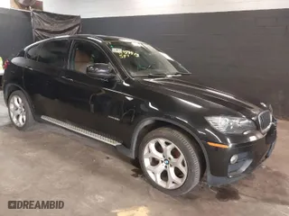 2014 BMW X6 xDrive35i with VIN 5UXFG2C51E0K41841, listed as a IAAI auction lot 41851513 with NaN miles. Bid and sale history available at carsss.com. Image 1.