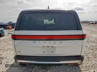 2023 Rivian R1S Adventure z VIN 7PDSGABA4PN026056, wystawiony jako Copart lot #56892495 z przebiegiem Nie podano mil oraz Szkoda całkowita • Salvage title. Historia ofert i sprzedaży dostępna na DreamBid. Obrazek 6.