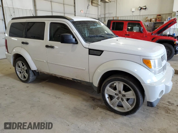 2011 Dodge Nitro Heat with VIN 1D4PT4GK4BW567965, listed as a Copart auction lot 49171705 with Not Provided miles and Clean Title. Bid and sale history available at DreamBid. Image 4.