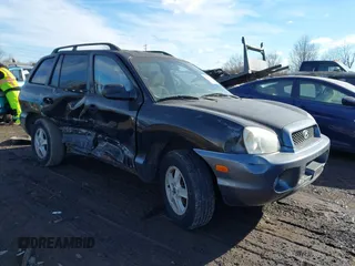 2002 Hyundai Santa Fe GLS z VIN KM8SC13D42U279688, wystawiony jako IAAI lot #41382467 z przebiegiem 160 372 mil mil oraz . Historia ofert i sprzedaży dostępna na DreamBid. Obrazek 1.
