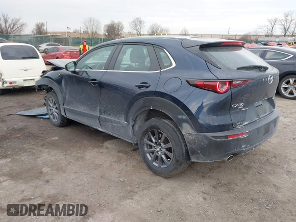 2022 Mazda CX-30 S with VIN 3MVDMBAL8NM411739, listed as a IAAI auction lot 41668265 with 34,964 mi miles and . Bid and sale history available at carsss.com. Image 3.