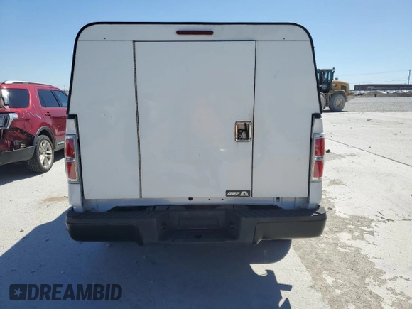 2014 Ford F-150 XL with VIN 1FTMF1CM4EKD33317, listed as a Copart auction lot 50059765 with 188,709 mi miles and Salvage title. Bid and sale history available at DreamBid. Image 6.