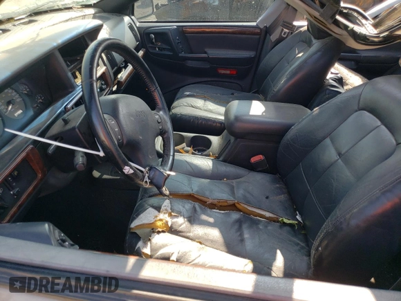 1998 Jeep Grand Cherokee Limited with VIN 1J4GZ78Y2WC146974, listed as a Copart auction lot 71435484 with 192,996 mi miles and Salvage Title. Bid and sale history available at carsss.com. Image 7.