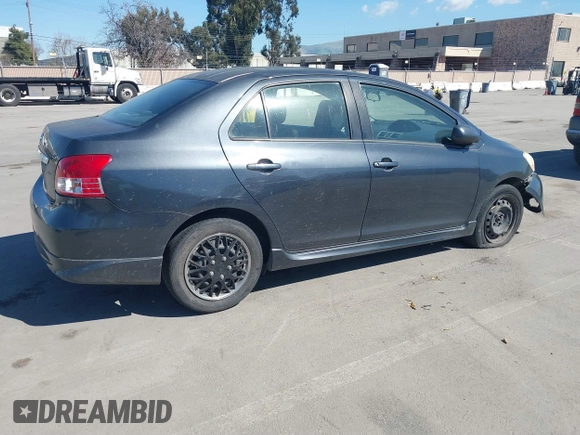 2007 Toyota Yaris with VIN JTDBT923371105048, listed as a IAAI auction lot 41759923 with 166,458 mi miles. Bid and sale history available at carsss.com. Image 4.