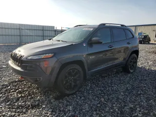 2016 Jeep Cherokee Trailhawk z VIN 1C4PJMBS4GW188840, wystawiony jako Copart lot #58760605 z przebiegiem 117 570 mil mil oraz Szkoda całkowita • Salvage title. Historia ofert i sprzedaży dostępna na DreamBid. Obrazek 1.
