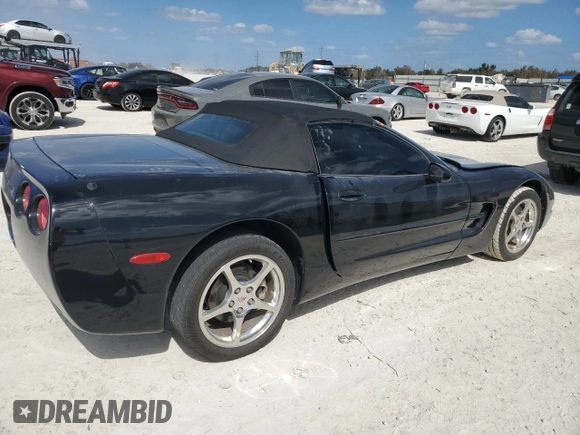 2004 Chevrolet Corvette with VIN 1G1YY32G245117541, listed as a Copart auction lot 77487344 with 43,759 mi miles and Salvage Title. Bid and sale history available at carsss.com. Image 3.