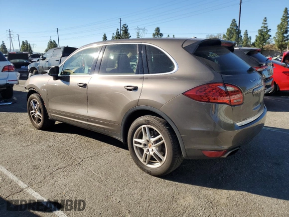 2014 Porsche Cayenne S Hybrid with VIN WP1AE2A2XELA50071, listed as a Copart auction lot 83904494 with 76,436 mi miles and Salvage title. Bid and sale history available at DreamBid. Image 2.