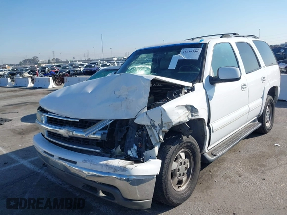 2002 Chevrolet Tahoe LS z VIN 1GNEC13TX2R240719, wystawiony jako IAAI lot #41616356 z przebiegiem 235 081 mil mil oraz . Historia ofert i sprzedaży dostępna na DreamBid. Obrazek 2.