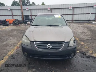 2002 Nissan Altima SL z VIN 1N4AL11D92C294136, wystawiony jako IAAI lot #42342860 z przebiegiem 220 080 mil mil oraz . Historia ofert i sprzedaży dostępna na DreamBid. Obrazek 12.