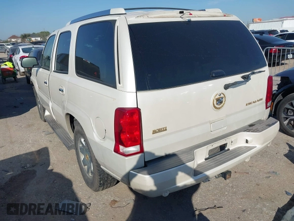 2005 Cadillac Escalade z VIN 1GYEC63TX5R114526, wystawiony jako IAAI lot #41685638 z przebiegiem 167 048 mil mil oraz . Historia ofert i sprzedaży dostępna na DreamBid. Obrazek 3.