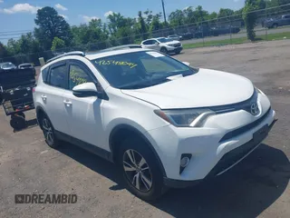 2016 Toyota RAV4 XLE with VIN JTMRFREV0GJ073114, listed as a IAAI auction lot 42548094 with 119,431 mi miles and . Bid and sale history available at DreamBid. Image 1.