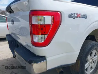2021 Ford F-150 XL with VIN 1FTFW1E82MKD23506, listed as a IAAI auction lot 41876760 with 71,387 mi miles. Bid and sale history available at carsss.com. Image 14.