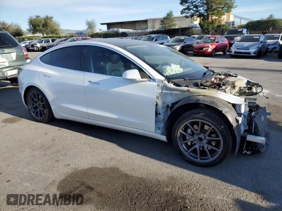 2020 Tesla Model 3 Standard Range Plus with VIN 5YJ3E1EA0LF808571, listed as a Copart auction lot 47827615 with 125,444 mi miles and Salvage Title. Bid and sale history available at DreamBid. Image 4.