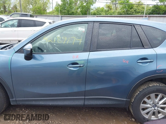 2016 Mazda CX-5 Touring z VIN JM3KE2CY3G0728968, wystawiony jako IAAI lot #42189174 z przebiegiem 145 977 mil mil oraz . Historia ofert i sprzedaży dostępna na DreamBid. Obrazek 15.
