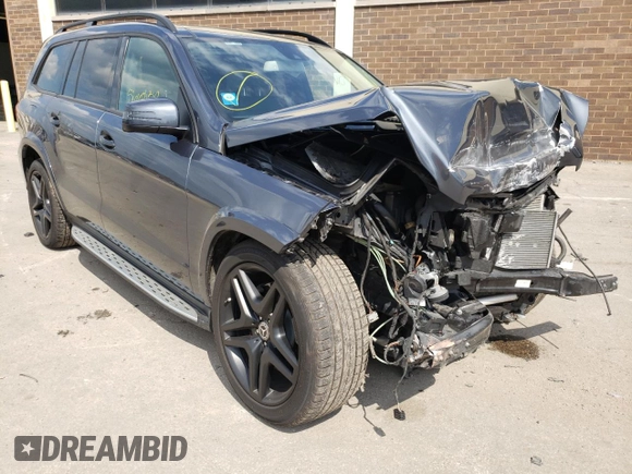2015 Mercedes-Benz GL-Class GL 550 with VIN 4JGDF7DE7FA561521, listed as a Copart auction lot 56681512 with 67,329 mi miles. Bid and sale history available at carsss.com. Image 1.