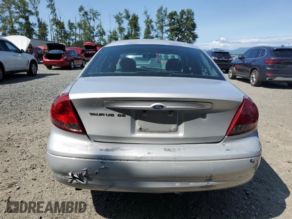 2005 Ford Taurus SE с VIN 1FAFP53U05A259841, выставлен на аукционе Copart как лот 57255835 с пробегом 179 821 миль миль и Списание • Salvage title. История ставок и продаж доступна на DreamBid. Изображение 6.