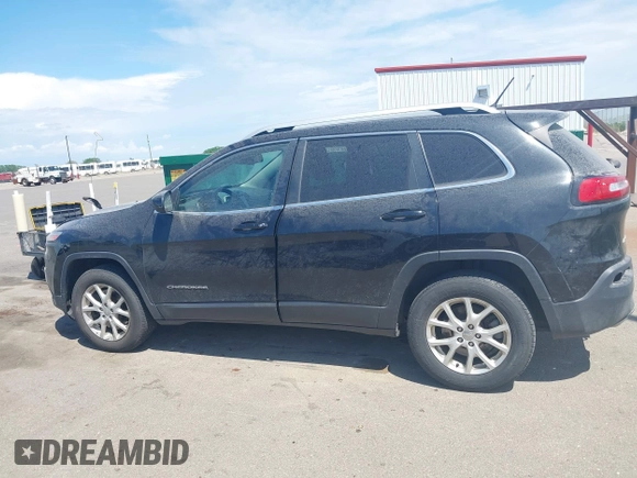 2015 Jeep Cherokee Latitude with VIN 1C4PJMCS3FW545440, listed as a IAAI auction lot 42268676 with 197,192 mi miles and . Bid and sale history available at DreamBid. Image 14.