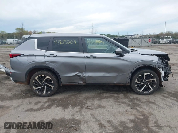 2022 Mitsubishi Outlander SE z VIN JA4J4UA83NZ023998, wystawiony jako IAAI lot #41923204 z przebiegiem 68 788 mil mil oraz . Historia ofert i sprzedaży dostępna na DreamBid. Obrazek 14.
