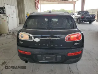 2016 MINI Clubman z VIN WMWLN5C51G2B28099, wystawiony jako Copart lot #55139845 z przebiegiem 89 683 mil mil oraz Szkoda całkowita • Salvage title. Historia ofert i sprzedaży dostępna na DreamBid. Obrazek 6.