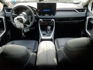 2024 Toyota RAV4 XLE Premium z VIN 2T3A1RFV5RW478819, wystawiony jako Copart lot #56818695 z przebiegiem 14 570 mil mil oraz Szkoda całkowita • Salvage title. Historia ofert i sprzedaży dostępna na DreamBid. Obrazek 8.