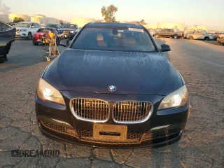 2011 BMW 7 Series 750i z VIN WBAKA8C57BCY36575, wystawiony jako Copart lot #77526024 z przebiegiem 120 087 mil mil oraz Czysty tytuł • Clean title. Historia ofert i sprzedaży dostępna na DreamBid. Obrazek 5.