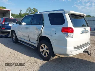 2011 Toyota 4Runner SR5 with VIN JTEZU5JR2B5014781, listed as a IAAI auction lot 42231932 with 124,646 mi miles and . Bid and sale history available at DreamBid. Image 3.