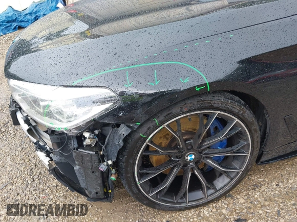 2018 BMW 5 Series M550i xDrive with VIN WBAJB9C5XJB286923, listed as a IAAI auction lot 42527301 with 76,923 mi miles and . Bid and sale history available at DreamBid. Image 21.