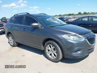 2015 Mazda CX-9 Sport with VIN JM3TB2BA7F0465965, listed as a IAAI auction lot 40348982 with 165,284 mi miles and . Bid and sale history available at carsss.com. Image 1.