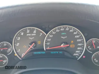 2012 Chevrolet Corvette 1LT with VIN 1G1YE2DW5C5102943, listed as a IAAI auction lot 42629221 with 66,979 mi miles and . Bid and sale history available at DreamBid. Image 7.