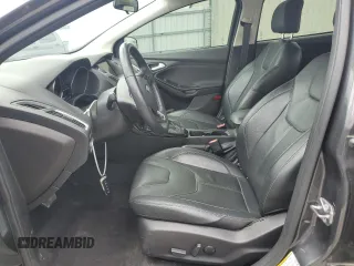 2017 Ford Focus Titanium z VIN 1FADP3N22HL307260, wystawiony jako Copart lot #61399785 z przebiegiem 103 293 mil mil oraz Szkoda całkowita • Salvage title. Historia ofert i sprzedaży dostępna na DreamBid. Obrazek 7.