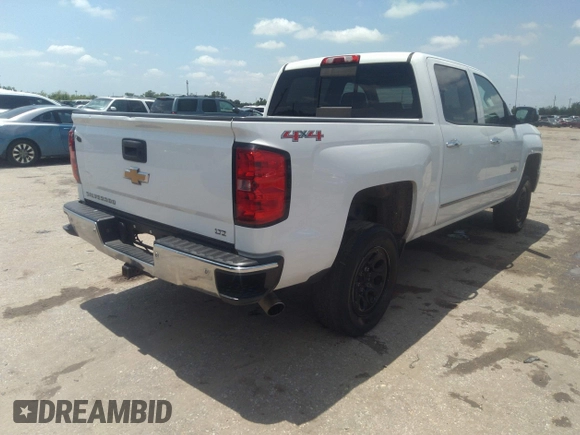2014 Chevrolet Silverado 1500 LTZ with VIN 3GCUKSEJ7EG526217, listed as a IAAI auction lot 42214663 with 232,805 mi miles and . Bid and sale history available at DreamBid. Image 4.