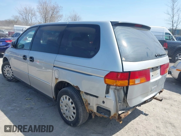 2002 Honda Odyssey LX z VIN 2HKRL18532H567409, wystawiony jako IAAI lot #42069502 z przebiegiem 173 662 mil mil oraz . Historia ofert i sprzedaży dostępna na DreamBid. Obrazek 3.