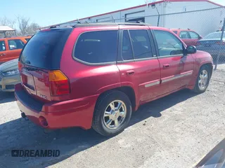 2002 GMC Envoy SLT with VIN 1GKDS13S922205147, listed as a IAAI auction lot 42041118 with 127,400 mi miles. Bid and sale history available at carsss.com. Image 4.
