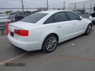 2013 Audi A6 Premium Plus with VIN WAUGFAFC6DN051237, listed as a IAAI auction lot 41553452 with 114,446 mi miles and . Bid and sale history available at DreamBid. Image 4.