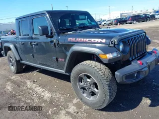 2021 Jeep Gladiator Rubicon with VIN 1C6JJTBG4ML529508, listed as a IAAI auction lot 41863291 with 54,753 mi miles and . Bid and sale history available at DreamBid. Image 1.