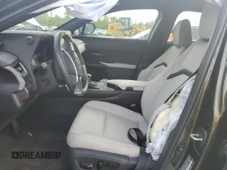2024 Lexus UX 250h Premium with VIN JTHP9JBH8R2072433, listed as a Copart auction lot 57704904 with 9,397 mi miles and Salvage Title. Bid and sale history available at DreamBid. Image 7.