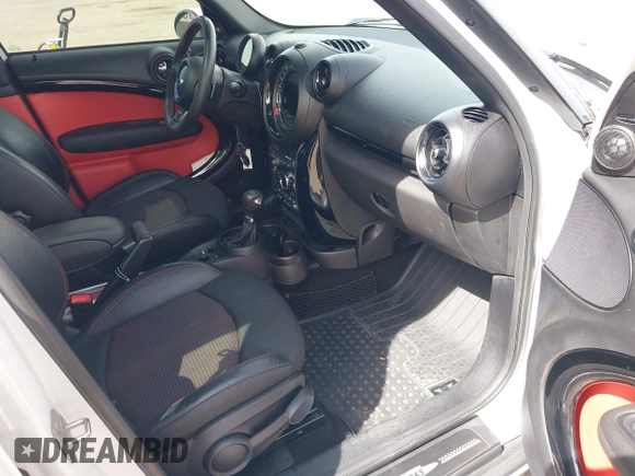 2016 MINI Countryman S with VIN WMWZC5C57GWU22015, listed as a IAAI auction lot 41806547 with 65,124 mi miles and . Bid and sale history available at DreamBid. Image 5.