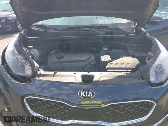 2021 Kia Sportage EX z VIN KNDPNCAC4M7897590, wystawiony jako IAAI lot #42183678 z przebiegiem 110 657 mil mil oraz . Historia ofert i sprzedaży dostępna na DreamBid. Obrazek 10.